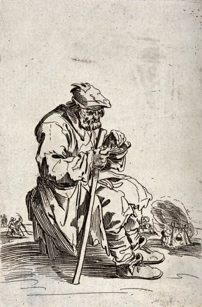 A bearded beggar sitting on a stone eats from a bowl while he holds his staff in his right hand