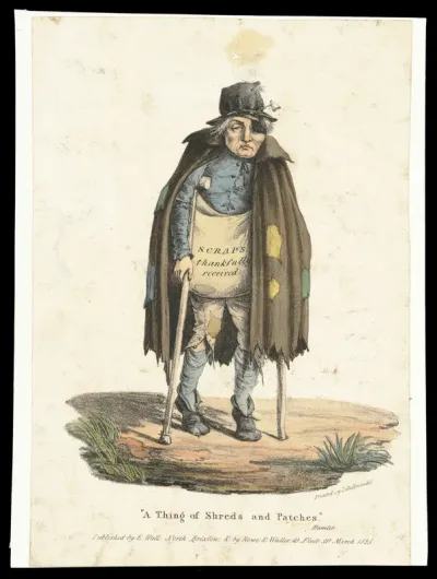A beggar dressed in ragged clothes walks on crutches begging for scraps
