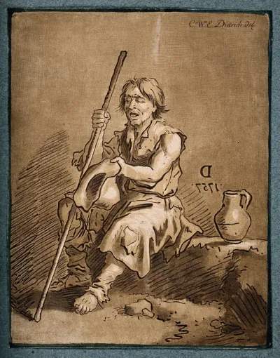 A blind beggar holds out his hat for money
