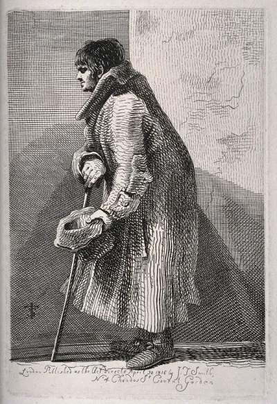 A blind beggar hunched over his walking stick, holding out his hat for money