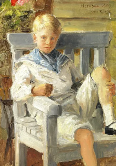 A boy in sailor suit, sitting on a white garden bench.