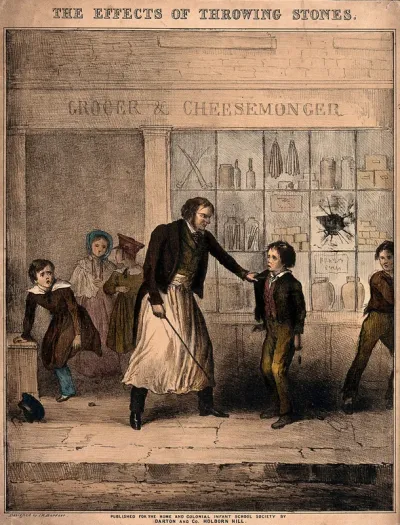 A boy is caught by a shopkeeper and threatened with a stick as punishment for breaking a window