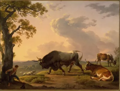 A bull attacked by a dog in an Italian landscape