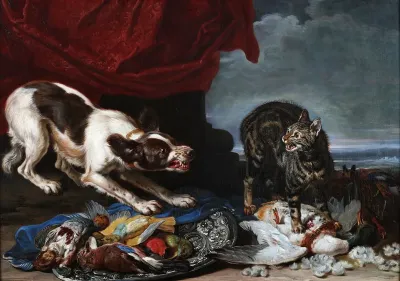 A cat and a dog fighting over fowl