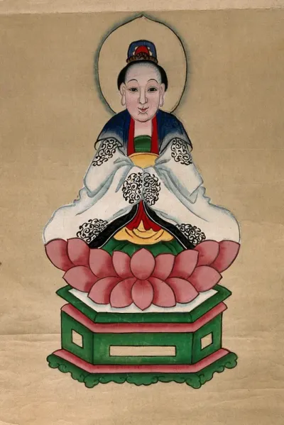 A Chinese deity seated on a lotus throne
