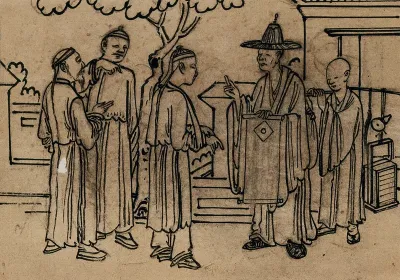 A Chinese doctor gives medical advice to man with his arm in a sling
