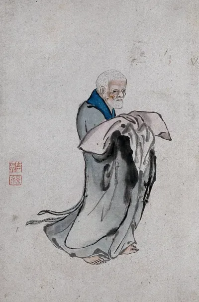 A Chinese man in grey robes holding a pillow
