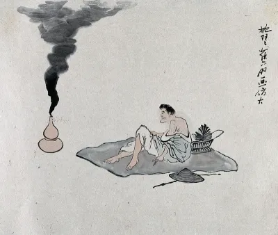A Chinese man lies on a blanket watching smoke rise from a lamp