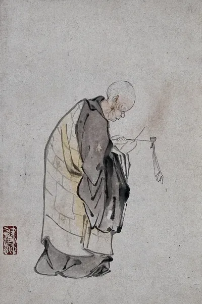 A Chinese man lighting a pipe