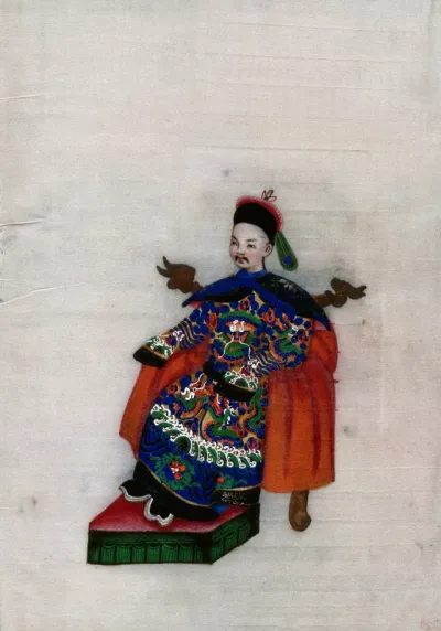 A Chinese man seated on dragon-headed chair