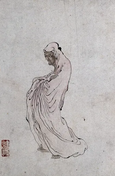 A Chinese man standing wearing a pink robe, directed to left