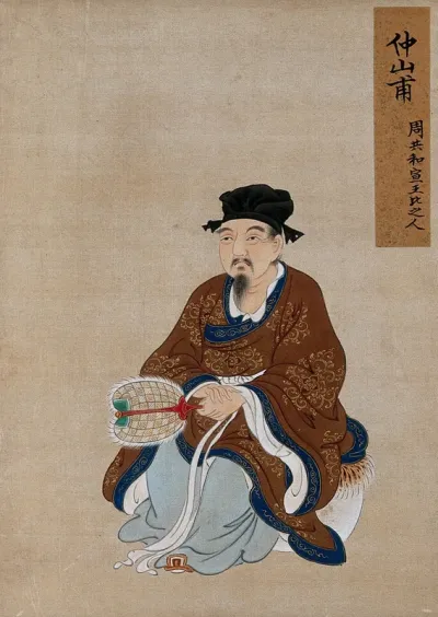 A Chinese seated figure with grey beard and black hat, with fan