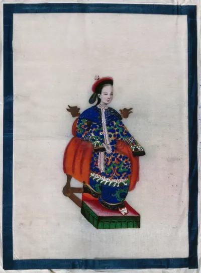 A Chinese woman seated on a dragon-headed chair