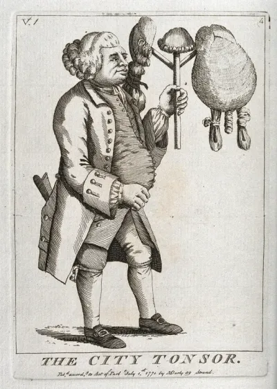 A City of London barber holding in his left hand three wigs placed on a frame; the first is a two-tailed wig, the second a small 'scratch' wig and the third a style worn by the macaronis