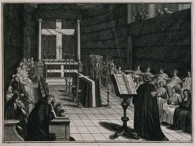 A coffin layed out on a bier in a chapel surrounded by a choir