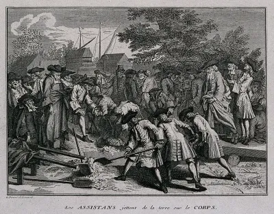 A congregation of Jewish mourners lowering a coffin into a grave during a funeral