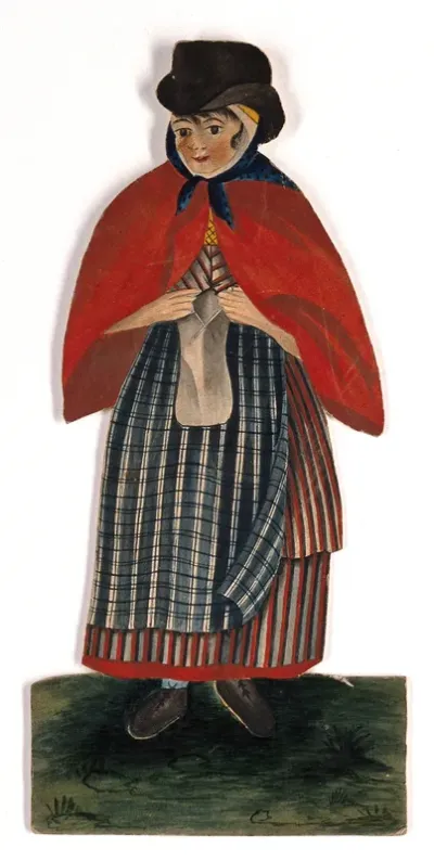 A country woman wearing hat and red cloak