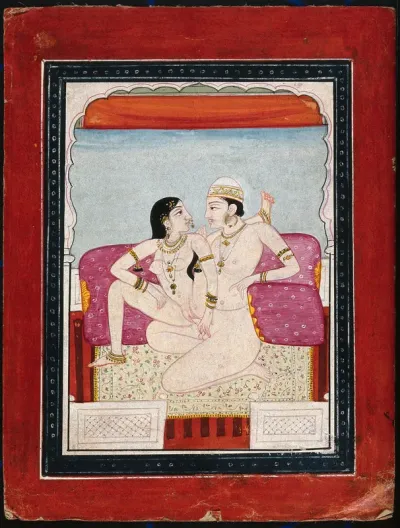 A couple engaged in sexual intercourse