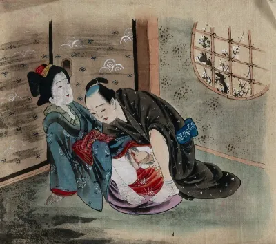 A couple making love in a room
