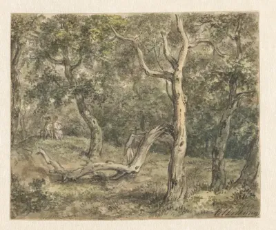A couple seated in the woods