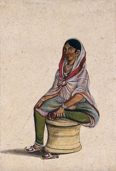 A courtesan sitting on a cane stool