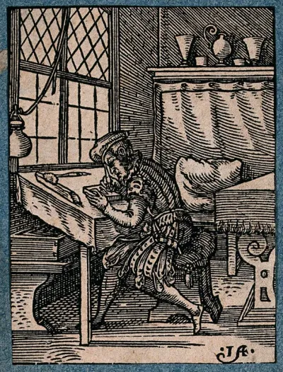 A craftsman making a woodcut