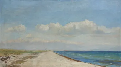 A Danish beach scenery from Bøtø with a windmill in the background.