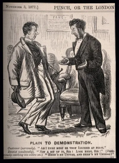 A dentist demonstrating the adaptability of false teeth to an apprehensive patient by taking out his own