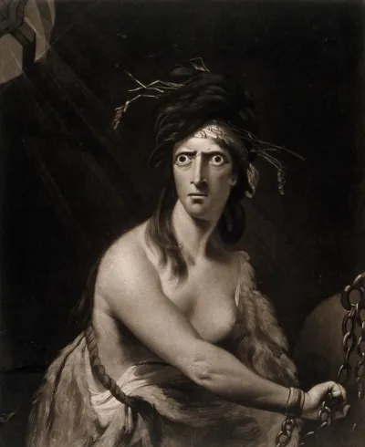 A distraught bare-breasted woman with staring eyes, straw in her hair and chained wrists, representing madness