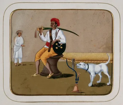 A dog growling at a soldier sitting on a muda (stool), next to a bed