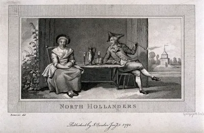 A Dutch man and woman sit at a table in a summer house; he smokes a pipe
