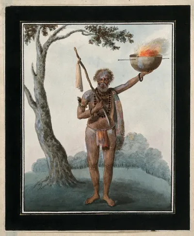 A fakir (mendicant monk) or holy man, holding up a bowl of fire