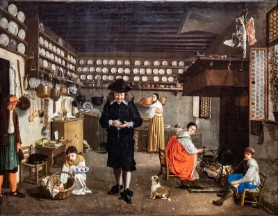 A family in a kitchen doing household tasks