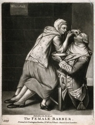 A female barber shaving a soldier