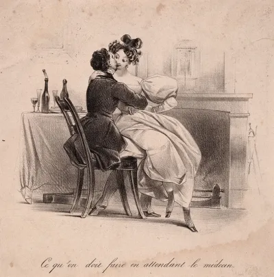 A female patient sits on her doctor's lap