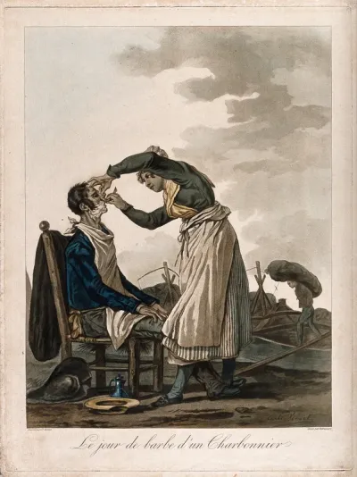 A female travelling barber shaving a man on the edge of a coal field