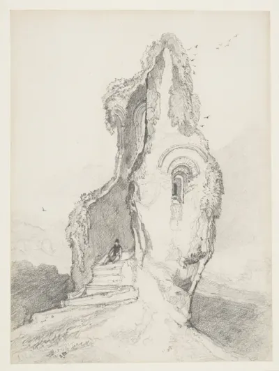 A figure resting in a ruined tower