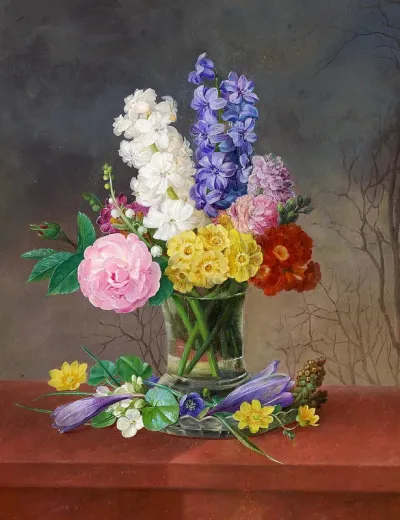 A flower bouquet in a glass vase.