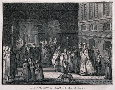 A funeral procession following a coffin, laid out on a bier, into a church