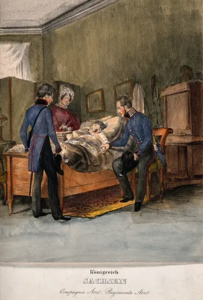 A German army doctor sits at a patient's bedside: a second soldier and a woman stand by