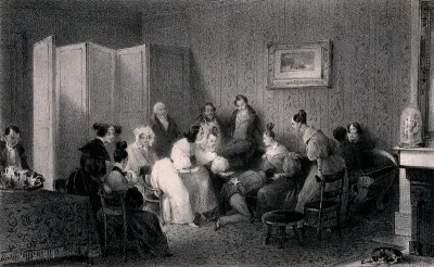 A group of men and women who appear to be playing a parlour game with a man's head in a lady's lap