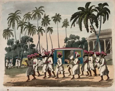 A group of men in turbans are carrying a litter, and attending to their passenger