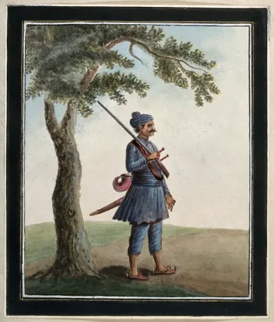 A guard carrying a rifle, a sword and a bugle horn (?)