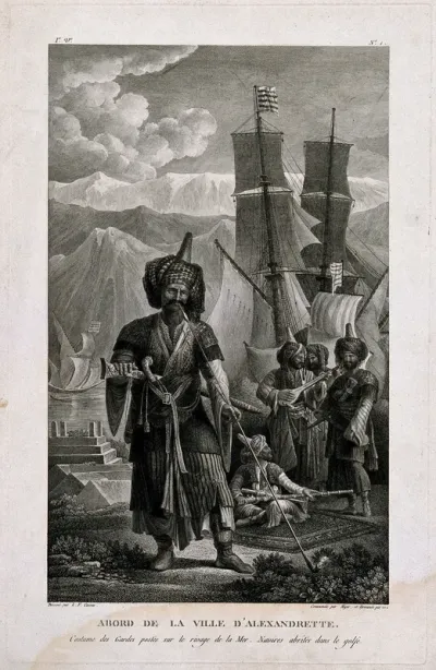 A guardsman standing on the dock in the gulf of Alexandretta, smoking a long-stemmed pipe