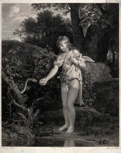 A half-naked youth offers food to a snake coiled round a tree trunk