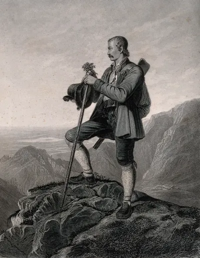 A huntsman in the Tyrol holding a walking stick, a hat and some heather is standing on the top of a hill looking over the land; a gun hangs on his shoulder