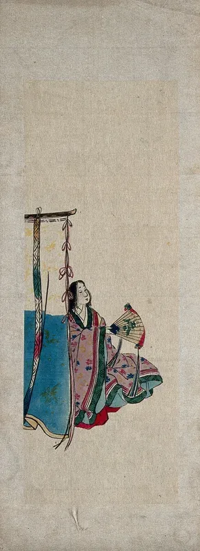 A Japanese woman holding a fan
