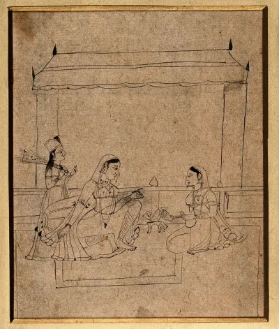 A lady sitting with two attendants