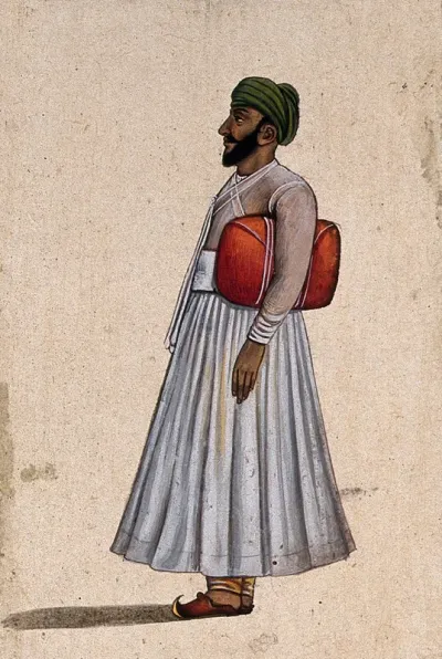 A Lucknow courtier holding a red folder under his arm