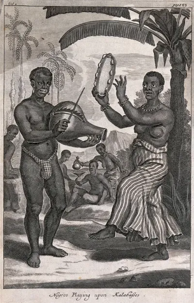 A man and a woman, both black, play musical instruments